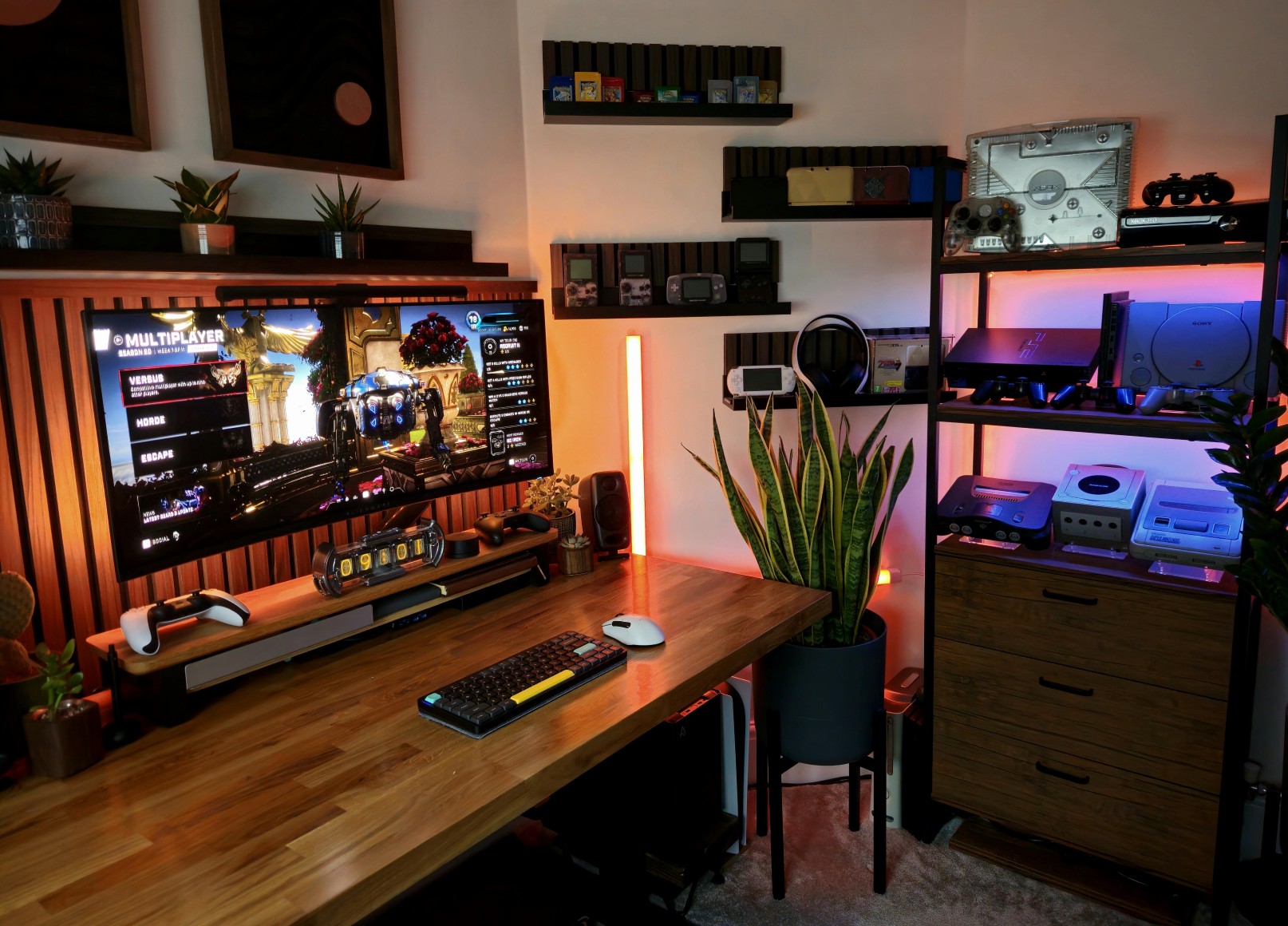 Reddit user xsabinx's cozy yet futuristic battlestation has it all. Dual monitors, RGB, retro gaming collection and more!